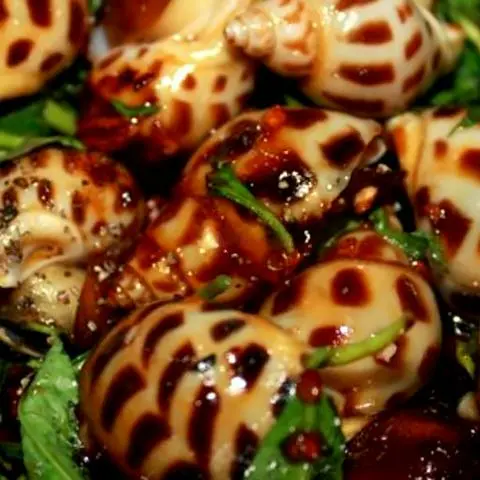 Hình ảnh Ốc hương xào me