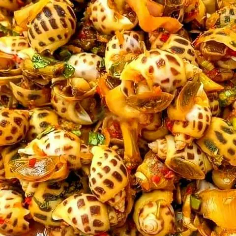 Hình ảnh Ốc hương xào tỏi