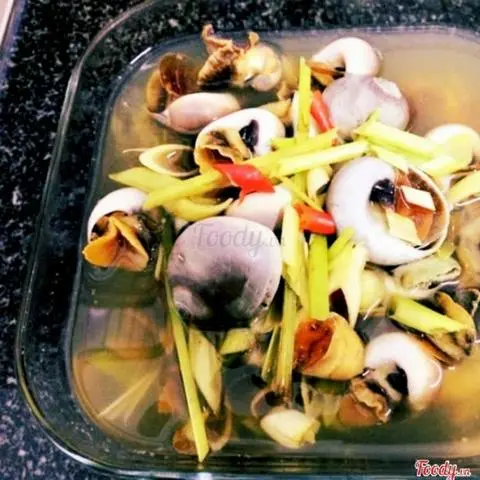 Hình ảnh Ốc mỡ xào rau muống