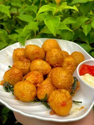 Hình ảnh Trứng cút cháy bơ tỏi