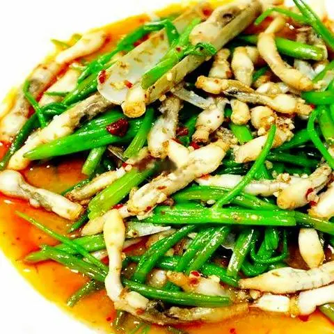 Hình ảnh Ốc móng tay xào rau muống