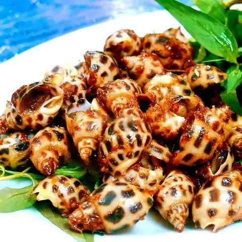 Hình ảnh Ốc hương xào tỏi