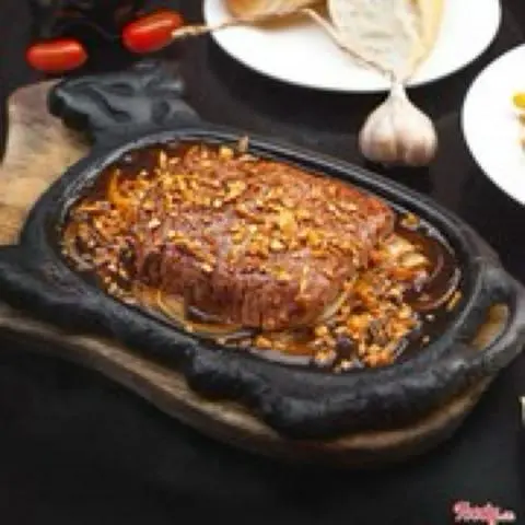 Hình ảnh Bò Úc sốt tỏi