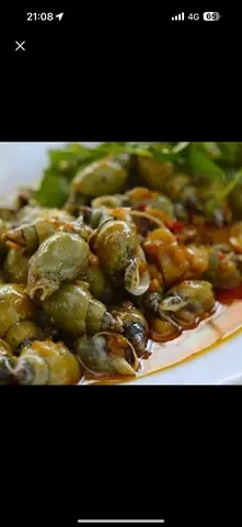 Hình ảnh Ốc Cà Na cháy tỏi