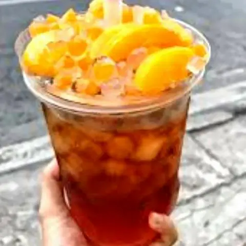 Hình ảnh Trà đào miếng size khổng lồ mix trân châu trắng