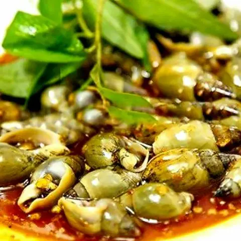 Hình ảnh Ốc cà na xào me