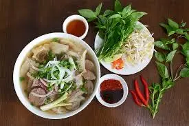 Hình ảnh phở thập cẩm-nước mía lớn