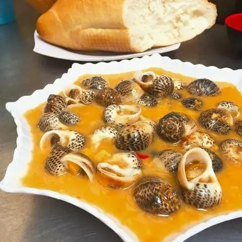 Hình ảnh ốc bông xào bơ cay