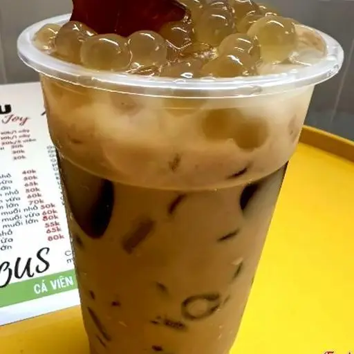 Hình ảnh Trà sữa đào hoàng kim
