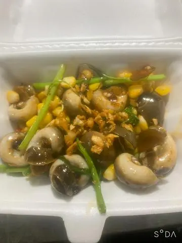 Hình ảnh ốc mỡ xào bơ cay