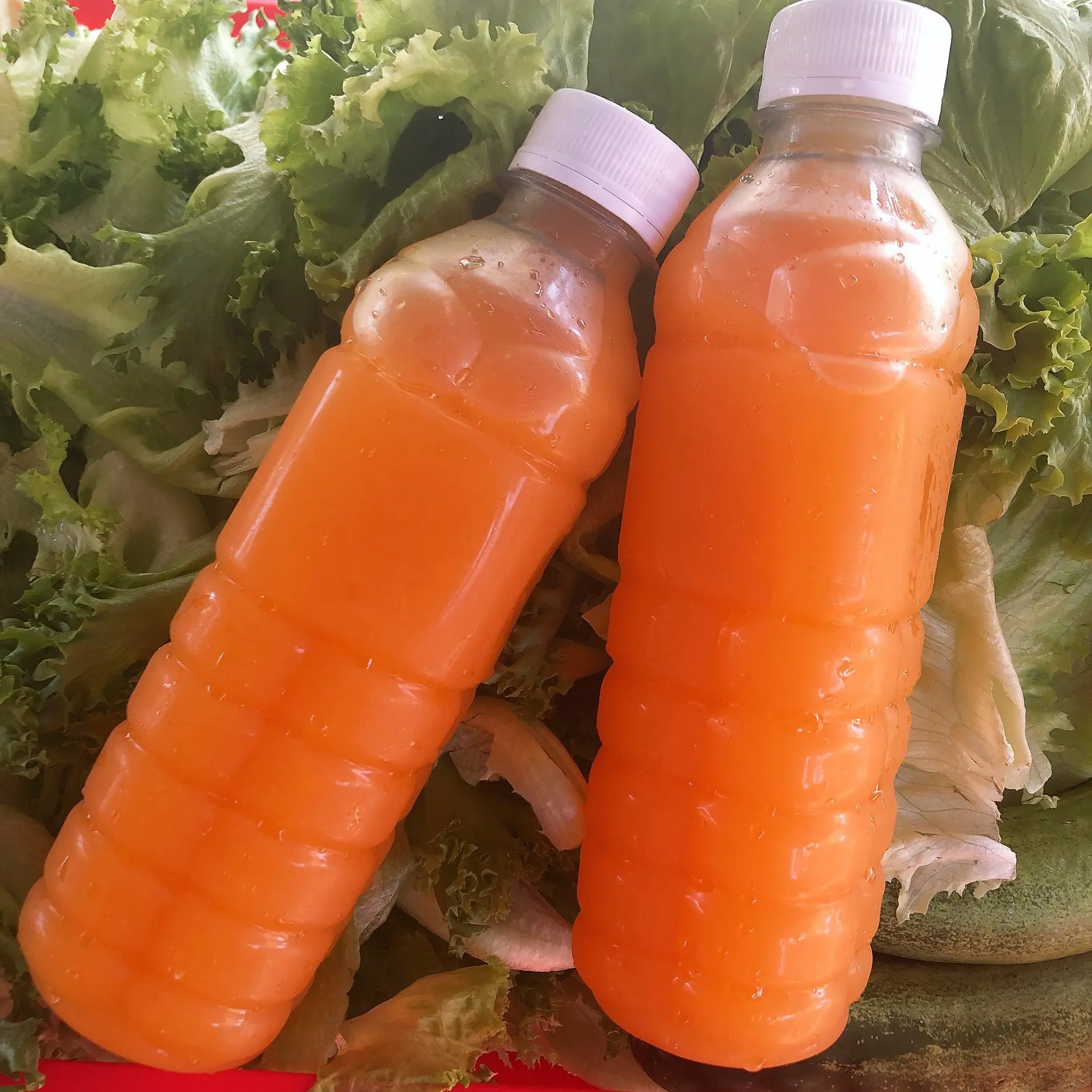 Hình ảnh Nước cam nguyên chất (chai kèm tẩy đá)