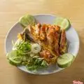 Hình ảnh Cơm đùi gà roti + canh củ sen hầm đuôi heo