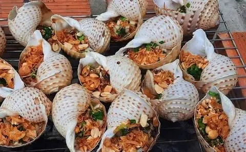 Hình ảnh Ốc giấy nướng tiêu xanh