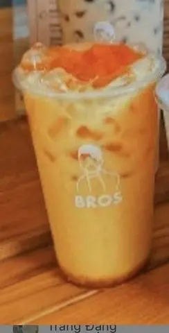 Hình ảnh Lục trà sữa xoài macchiato (M)/Mango green milk tea macchiato