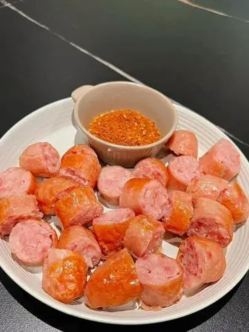 Hình ảnh Combo 2 Xúc Xích nướng đá bột ớt cay tê