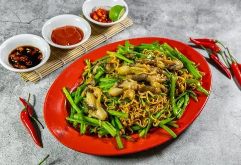 Hình ảnh ốc móng tay xào mì