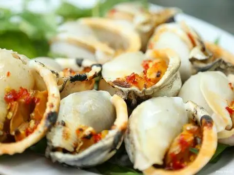 Hình ảnh ốc tỏi nướng muối ớt 1con 