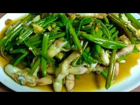Hình ảnh Ốc móng tay xào rau muống