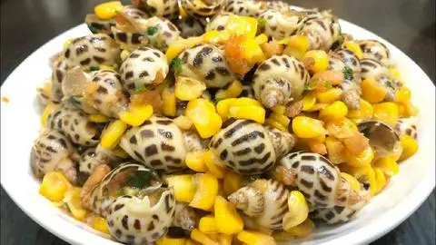 Hình ảnh Ốc hương xào bơ bấp