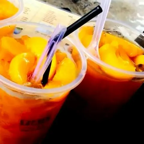 Hình ảnh ( best seller ) Trà đào ly 700ml ( 4 miếng đào giòn )