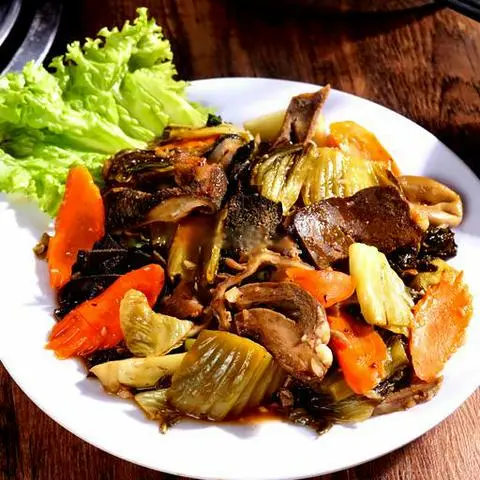Hình ảnh Lòng bò thập cẩm xào cải chua