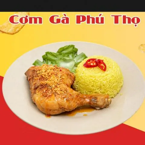 Hình ảnh Cơm gà đùi góc 4 sốt mắm tỏi