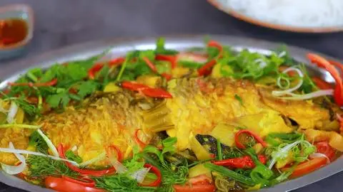Hình ảnh Cá chép om dưa