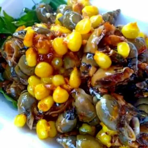 Hình ảnh Ốc móng tay xào bắp