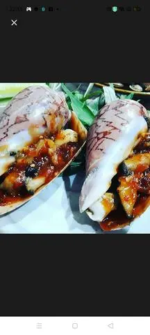 Hình ảnh Ốc giác nướng tiêu xanh (con)