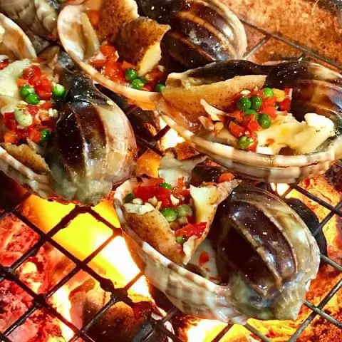 Hình ảnh Ốc Khế Nướng Mở Hành 