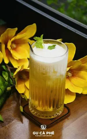Hình ảnh Trà sen vàng macchiato