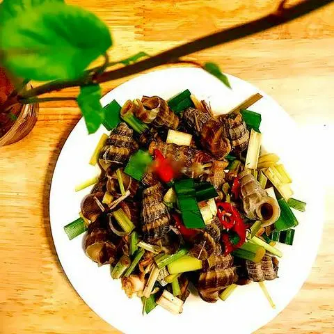 Hình ảnh Ốc len xào bơ tỏi