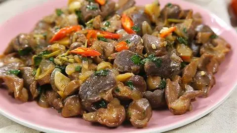 Hình ảnh Cơm Tim Mề Gà Xào Hành
