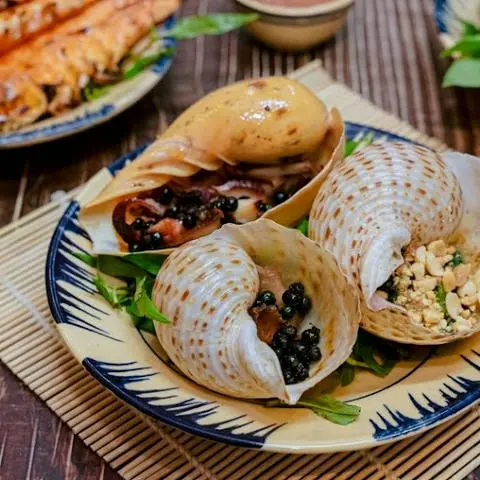Hình ảnh Ốc giấy nướng tiêu