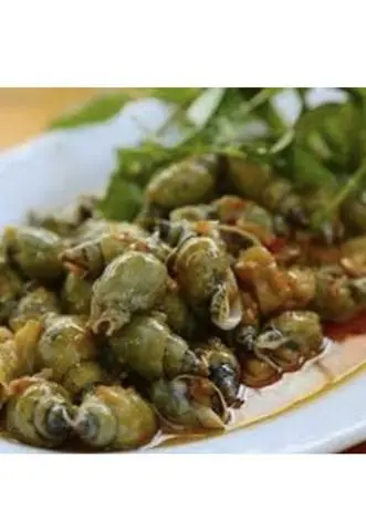 Hình ảnh Ốc cà na xào bơ tỏi (bắp mỹ, tóp mỡ)