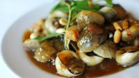 Hình ảnh ốc mở xào me 