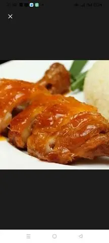 Hình ảnh cơm gà xối mỡ má đùi sốt me tặng kèm nước uống 