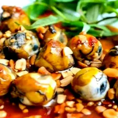 Hình ảnh Cút lộn xào me