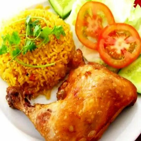 Hình ảnh Cơm đùi gà 1/4 xối mỡ