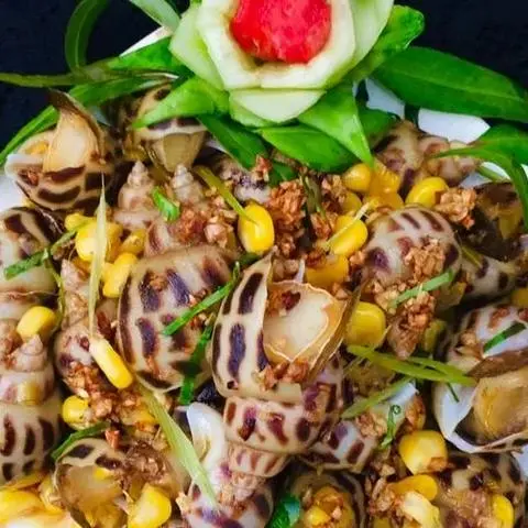 Hình ảnh Ốc hương xào tỏi bắp