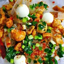 Hình ảnh Bánh tráng phơi sương trộn mỡ hành tóp mỡ