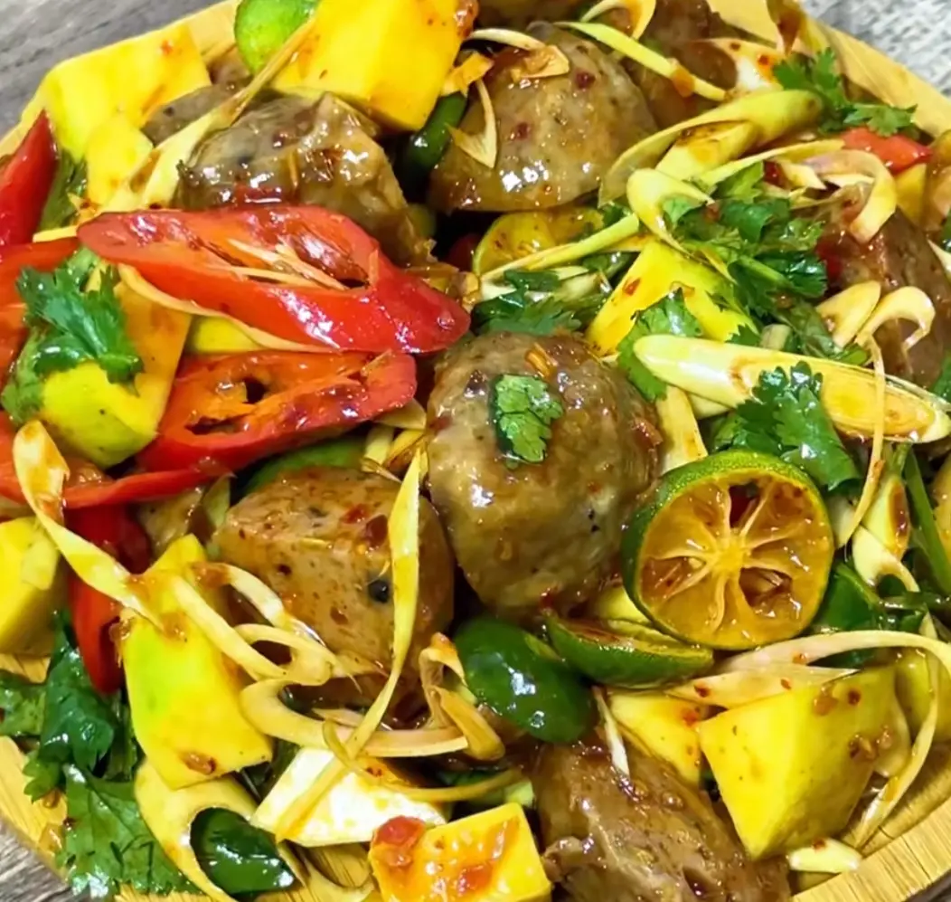 Hình ảnh Bò Viên Gân Sốt Thái Lớn