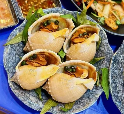 Hình ảnh Ốc tỏi nướng tiêu