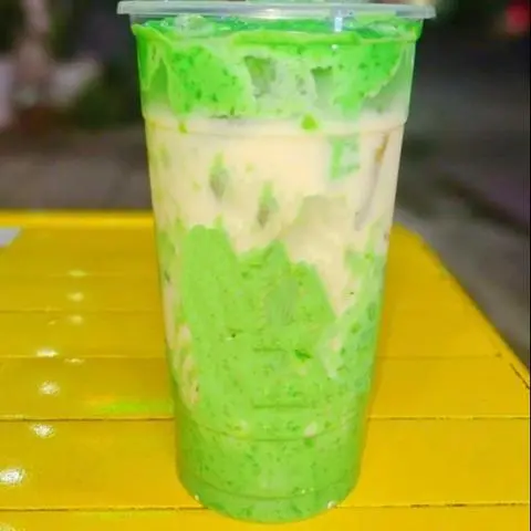 Hình ảnh Trà Sữa Sốt Cốm, Dừa Sợi Phú Sĩ, Pudding, Củ Năng Hoa Hồng (700ml)