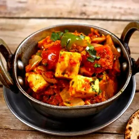 Hình ảnh Karahi Paneer ( Phô mai nhà làm xào ớt chuông + hành tây sốt Cà ri)