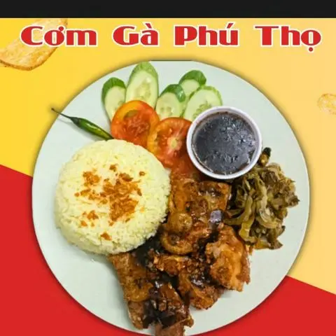 Hình ảnh Cơm gà má đùi sốt tiêu