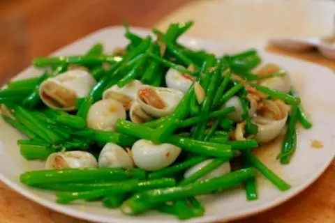 Hình ảnh Ốc mỡ xào bơ tỏi rau muống