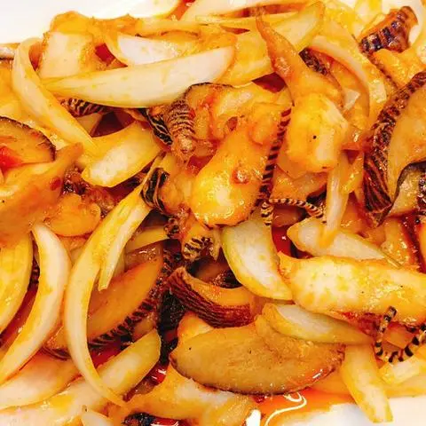Hình ảnh Ốc giác xào sate