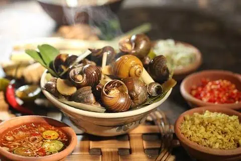 Hình ảnh ốc lác nướng mỡ hành