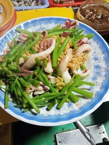 Hình ảnh mực xào bơ bắp 